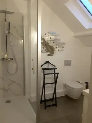 Salle de bains dans l'établissement La Maison de Ville