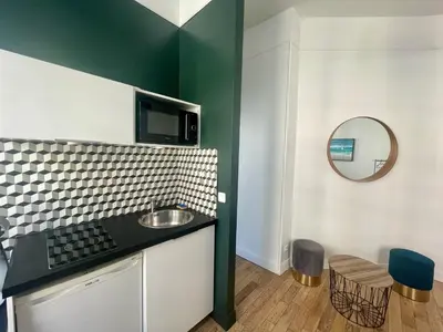 Cuisine ou kitchenette dans l'établissement Charming Central Apartment - Reims