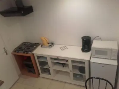 Cuisine ou kitchenette dans l'établissement jolie appartement centre de Fismes