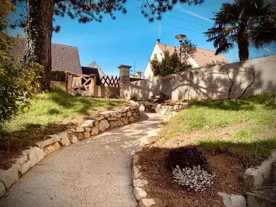 Jardin de l'établissement Chambre en rez de jardin