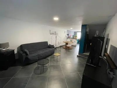 Télévision ou salle de divertissement dans l'établissement Logement du Paquis