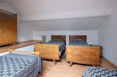 Un ou plusieurs lits dans un hébergement de l'établissement ApartHotel François 1er 14eme