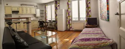 Cuisine ou kitchenette dans l'établissement ApartHotel François 1er 14eme