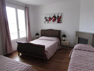 Un ou plusieurs lits dans un hébergement de l'établissement ApartHotel François 1er 14eme