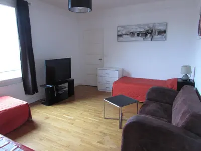 Coin salon dans l'établissement ApartHotel François 1er 16ème