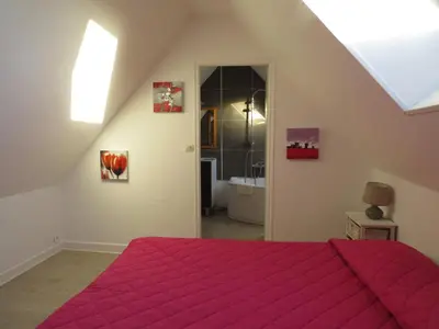 Un ou plusieurs lits dans un hébergement de l'établissement ApartHotel François 1er 16ème