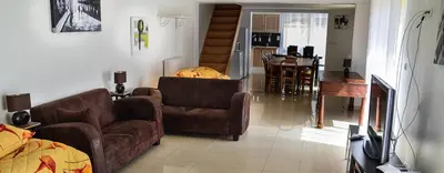 Coin salon dans l'établissement Gîte les Moignottes