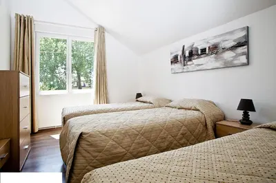 Un ou plusieurs lits dans un hébergement de l'établissement Gîte les Moignottes