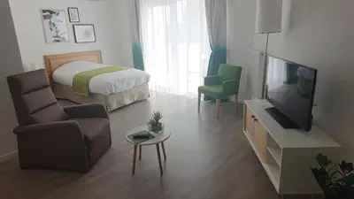 Télévision ou salle de divertissement dans l'établissement DOMITYS - Le château de la Pilule