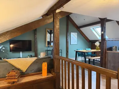 Télévision ou salle de divertissement dans l'établissement LE CHAMPENOIS-Appartement central près de l' Avenue de Champagne