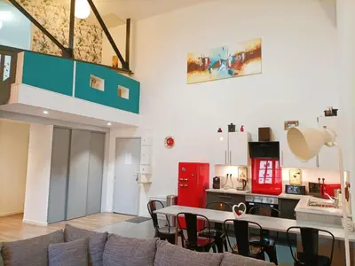 Cuisine ou kitchenette dans l'établissement Superbe appartement type loft en duplex rue Buat