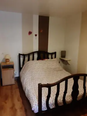 Un ou plusieurs lits dans un hébergement de l'établissement Chambre d'Hôtes avec Petit Déjeuner