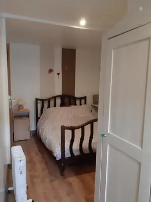 Un ou plusieurs lits dans un hébergement de l'établissement Chambre d'Hôtes avec Petit Déjeuner