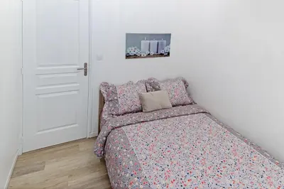 Un ou plusieurs lits dans un hébergement de l'établissement Le cosy fertois-self checkin-centre-ville