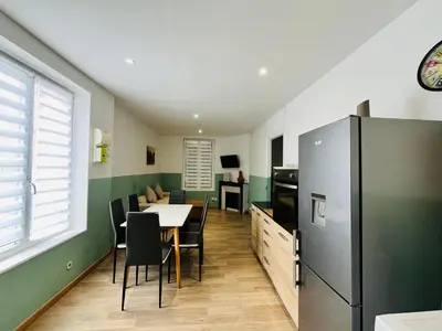 Cuisine ou kitchenette dans l'établissement L'Athéna