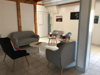 Coin salon dans l'établissement L’Ecrin champenois : 150m2 au cœur du vignoble