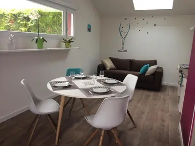 Coin salon dans l'établissement Maison Mitoyenne