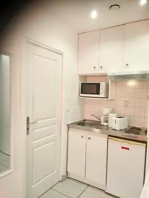 Cuisine ou kitchenette dans l'établissement Rive gauche