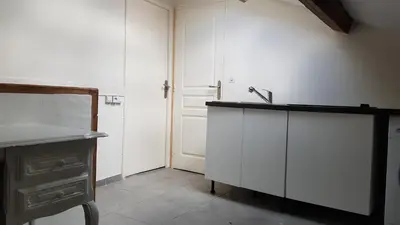 Cuisine ou kitchenette dans l'établissement Cosy F3 proche de DisneyLand Paris