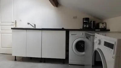 Cuisine ou kitchenette dans l'établissement Cosy F3 proche de DisneyLand Paris
