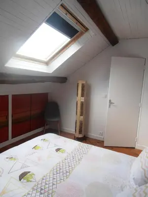 Un ou plusieurs lits dans un hébergement de l'établissement Gîte des Corneilles