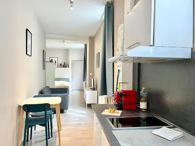 Cuisine ou kitchenette dans l'établissement Suite Orphelins 2 (rdc)