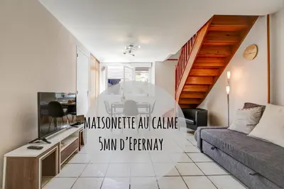 Télévision ou salle de divertissement dans l'établissement Le Fournil