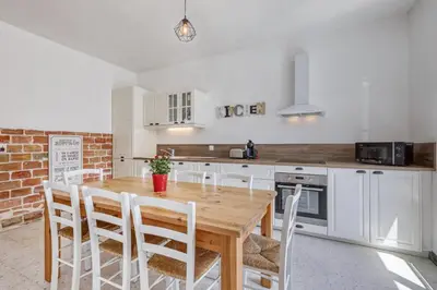Cuisine ou kitchenette dans l'établissement Gite de Lizy