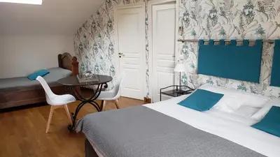 Un ou plusieurs lits dans un hébergement de l'établissement La Closerie des Sacres