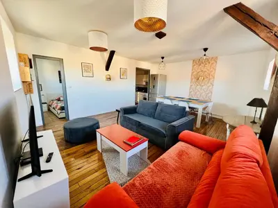 Coin salon dans l'établissement Appartement coeur centre-ville cosy et chaleureux rue Carnot