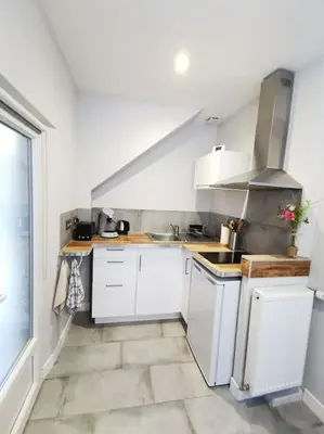 Cuisine ou kitchenette dans l'établissement Les Bulles d'Aÿ - Studio