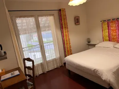 Un ou plusieurs lits dans un hébergement de l'établissement Chambres d'hôtes Aux Portes des Tumuli