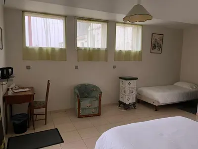 Un ou plusieurs lits dans un hébergement de l'établissement Chambres d'hôtes Aux Portes des Tumuli