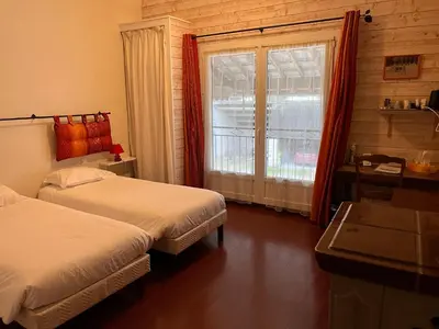 Un ou plusieurs lits dans un hébergement de l'établissement Chambres d'hôtes Aux Portes des Tumuli