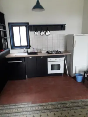 Cuisine ou kitchenette dans l'établissement GrIsa'Home le gîte