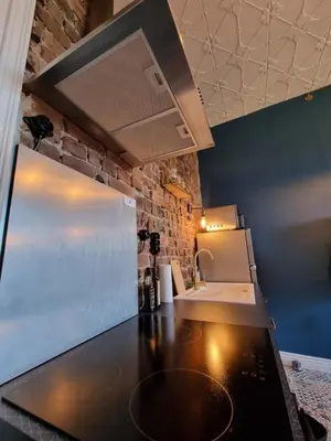 Cuisine ou kitchenette dans l'établissement Gîtes Familistère Landrecies - Guise