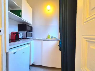 Cuisine ou kitchenette dans l'établissement La Terrasse - Vue cathédrale - Hyper centre 1D