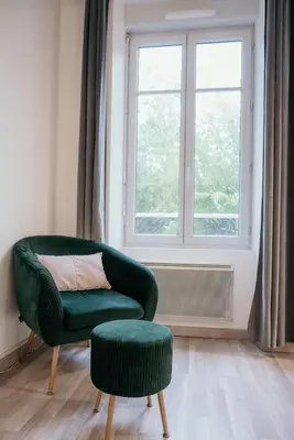 Coin salon dans l'établissement La suite Delahaye