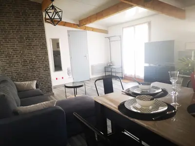 Coin salon dans l'établissement Le Temps d une Pause à Boursault