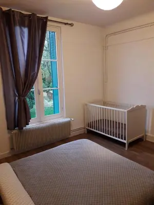 Un ou plusieurs lits dans un hébergement de l'établissement Appartement 80m2 dans belle demeure