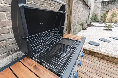 Barbecue disponible mis à disposition des clients de l'appartement
