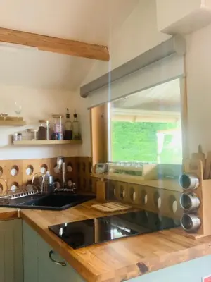 Cuisine ou kitchenette dans l'établissement Chalet La Romance
