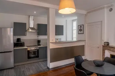 Cuisine ou kitchenette dans l'établissement Suite Ophélie