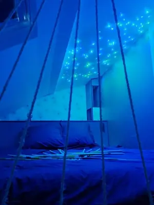 Un ou plusieurs lits dans un hébergement de l'établissement Ma nuit ô spA