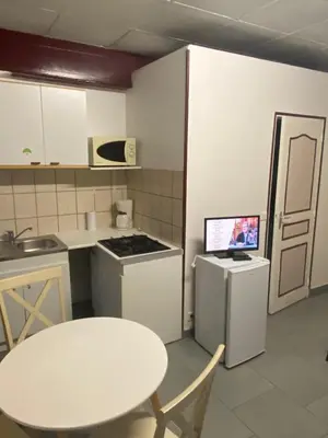 Cuisine ou kitchenette dans l'établissement la chambre de Jade
