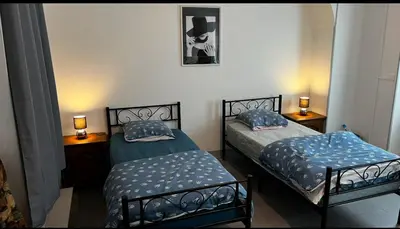 Un ou plusieurs lits dans un hébergement de l'établissement la chambre de Jade
