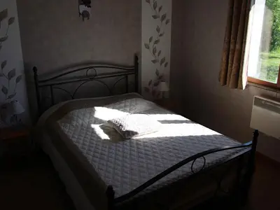 Un ou plusieurs lits dans un hébergement de l'établissement Gîte champêtre avec pêche, animaux admis - FR-1-585-6