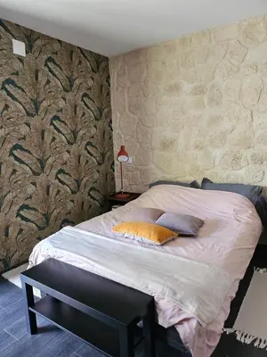 Un ou plusieurs lits dans un hébergement de l'établissement B&B Arum Mercin et Vaux L'Arthome chambres d'hôtes