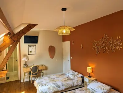Un ou plusieurs lits dans un hébergement de l'établissement Chambres d'hôtes et logement insolite - Les Canards de la Germaine