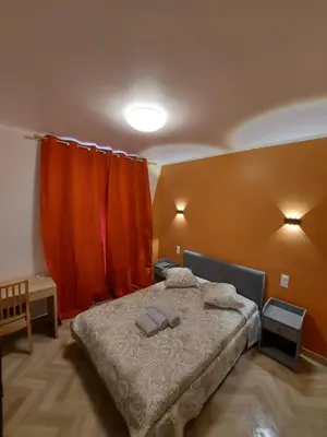 Un ou plusieurs lits dans un hébergement de l'établissement Ardenn'Hotel